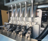 Multi-lane vertical series packaging machine